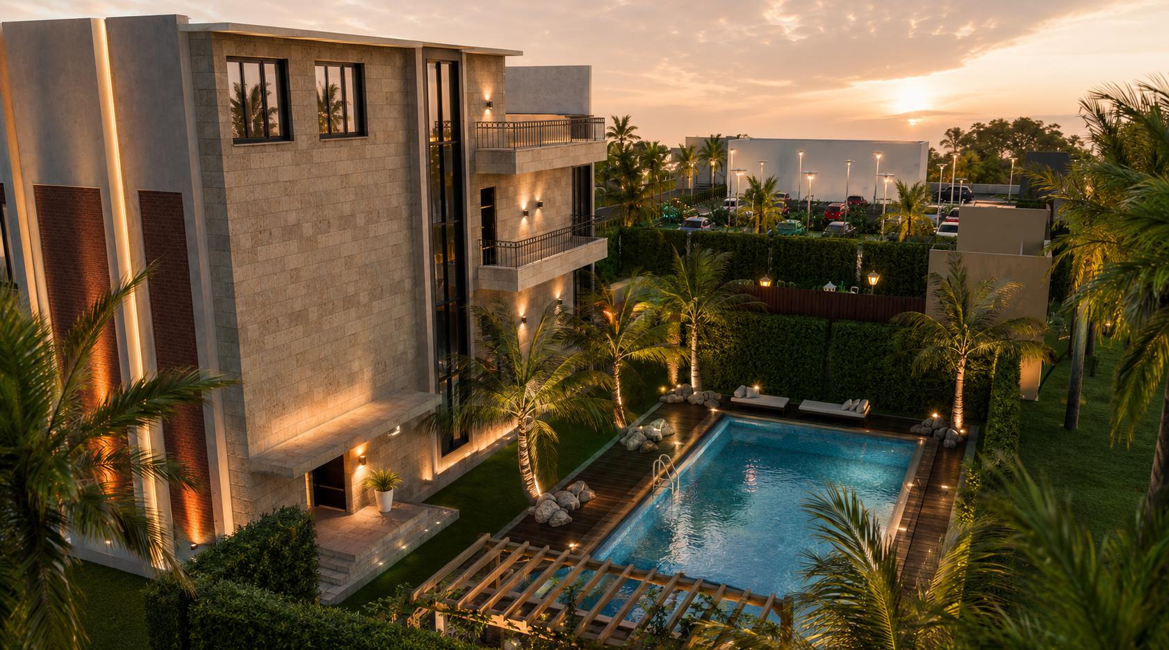 The pool deck at sunset with the guest block alongside