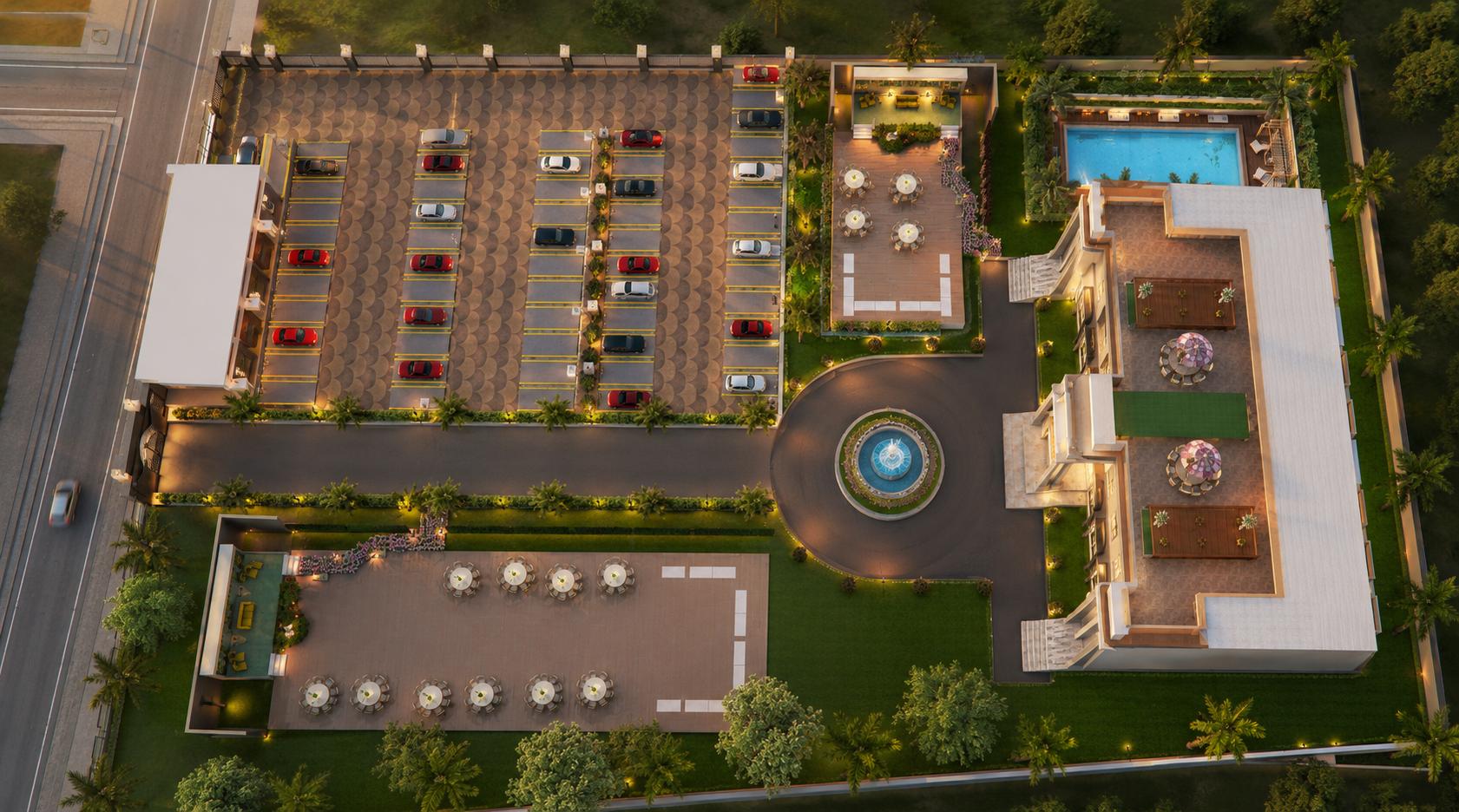 Top-down aerial of the whole property showing parking, the pool, the banquet block and dining lawns